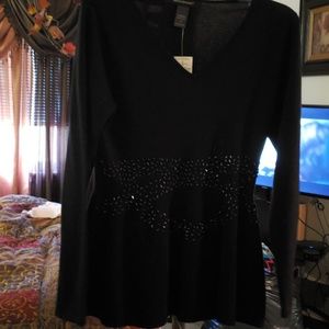 Peplum top with bead detailing